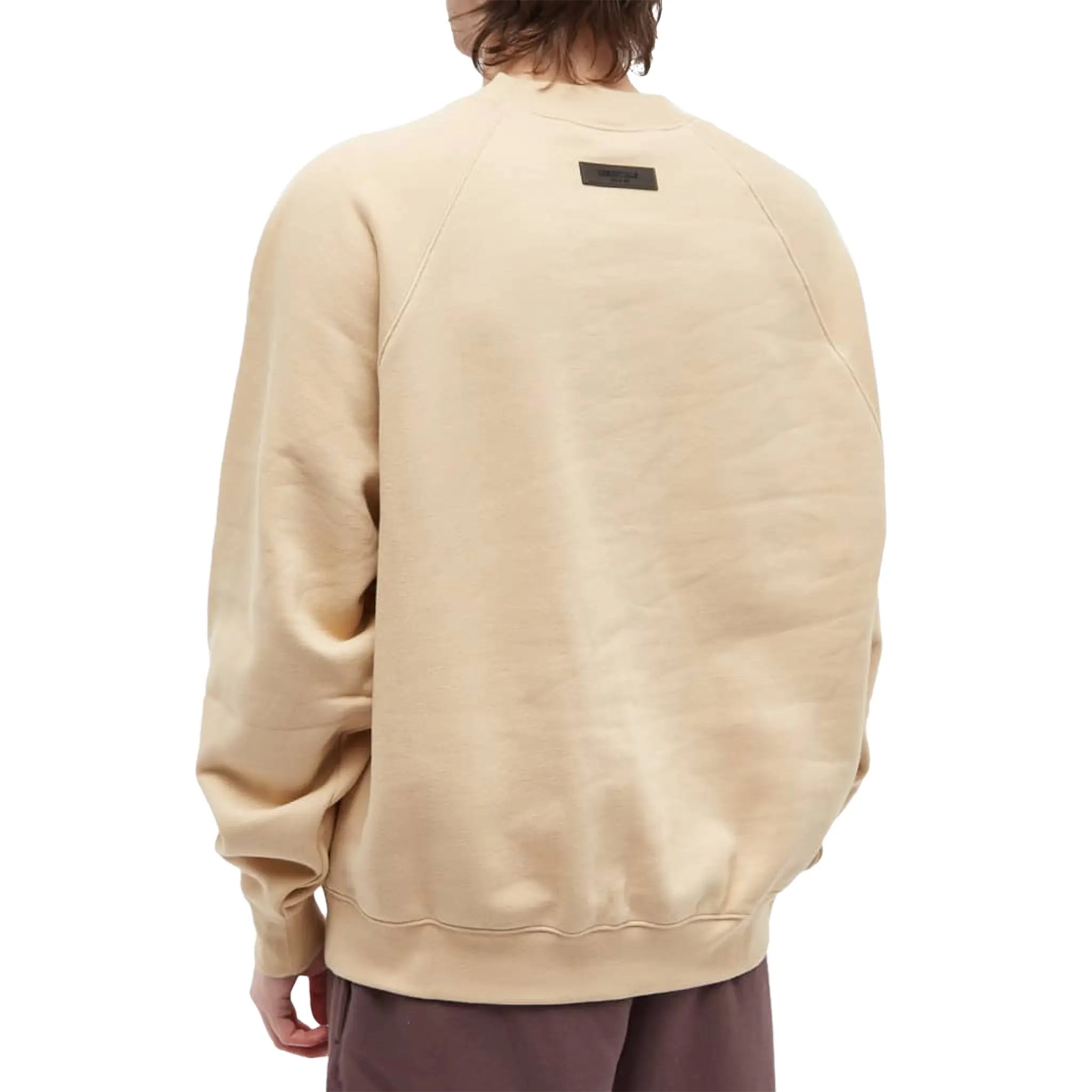 Model backl view of Fear Of God Essentials Sand Sweatshirt (SS23)